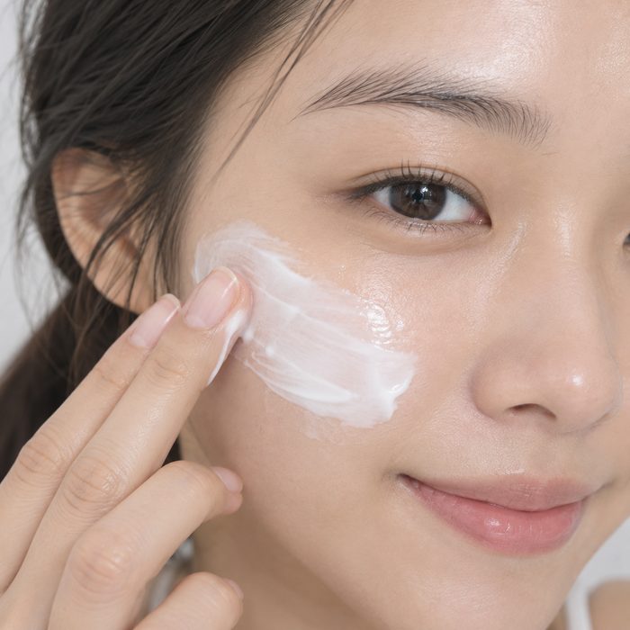 Step 4, Follow up. Moisturiser layered over the cheek afterwards